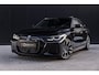 BMW i4 M50 High Executive 84 kWh | SOH 98% | M-Sport | Schuif/Kantel dak | Sportstoelen | Harman/Kardon | x-Drive | Widescreen | Adaptief Onderstel | DAB | Stoelen/stuur verwarmbaar | Trekhaak | Laserlicht |