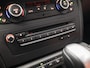 BMW X1 xDrive28i Executive Sport 259Pk Automaat (YOUNGTIMER, 6 CILINDER, NAVIGATIE, CLIMATE, LEDEREN SPORTSTOELEN, ZWART HEMEL, BLUETOOTH, GETINT GLAS, PARKEERSENSOREN, CRUISE, NIEUWSTAAT)