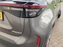 Toyota Yaris Cross 1.5 Hybrid Executive Meest luxe uitvoering.Zeer nette en bomvolle auto. rondom camera's,panorama dak, trekhaak,