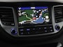 Hyundai Tucson 1.6 GDi Comfort | Trekhaak | Camera | Achterbankverwarming | Navigatie | Stoelverwarming | Climate control | Parkeerhulp | Cruise control | DAB | Regensensor