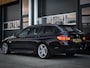 BMW 5-Serie Touring 520i M-Sport | PANO | TREKHAAK | HEAD UP DISPLAY | CARBONSCHWARZ METTALIC | LEDER | XENON