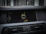 BMW 5-Serie Touring 520i M-Sport | PANO | TREKHAAK | HEAD UP DISPLAY | CARBONSCHWARZ METTALIC | LEDER | XENON