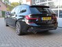BMW 3-Serie Touring 320i High Executive M-Sport Edition.