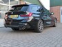 BMW 3-Serie Touring 320i High Executive M-Sport Edition.