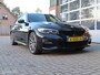 BMW 3-Serie Touring 320i High Executive M-Sport Edition.