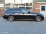 BMW 3-Serie Touring 320i High Executive M-Sport Edition.