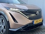 Nissan Ariya Evolve 91 kWh Automaat / WLTP bereik 516 km / Trekgewicht 750 kg / CCS snelladen / Elektrisch Glazen Schuif- en Kanteldak / Elektrisch Verstelbare Voorstoelen met geheugenset / Adaptieve Cruise Control /  Keyless Entry & Start /  Stoelventilatie / Stuur-, stoel- en achterbankverwarming / Voorruitverwarming / HUD / Camera 360° /