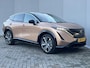 Nissan Ariya Evolve 91 kWh Automaat / WLTP bereik 516 km / Trekgewicht 750 kg / CCS snelladen / Elektrisch Glazen Schuif- en Kanteldak / Elektrisch Verstelbare Voorstoelen met geheugenset / Adaptieve Cruise Control /  Keyless Entry & Start /  Stoelventilatie / Stuur-, stoel- en achterbankverwarming / Voorruitverwarming / HUD / Camera 360° /