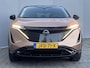 Nissan Ariya Evolve 91 kWh Automaat / WLTP bereik 516 km / Trekgewicht 750 kg / CCS snelladen / Elektrisch Glazen Schuif- en Kanteldak / Elektrisch Verstelbare Voorstoelen met geheugenset / Adaptieve Cruise Control /  Keyless Entry & Start /  Stoelventilatie / Stuur-, stoel- en achterbankverwarming / Voorruitverwarming / HUD / Camera 360° /