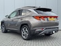Hyundai Tucson 1.6 T-GDI HEV Premium Sky Eerste eigenaar/ Dealer onderhouden / Glazen schuif- en kanteldak / Trekgewicht 1650 Kg/ Trekhaak  / Elektrische achterklep / Adaptief cruise control / Stuur- en Stoelverwarming / Stoelventilatie /