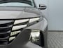 Hyundai Tucson 1.6 T-GDI HEV Premium Sky Eerste eigenaar/ Dealer onderhouden / Glazen schuif- en kanteldak / Trekgewicht 1650 Kg/ Trekhaak  / Elektrische achterklep / Adaptief cruise control / Stuur- en Stoelverwarming / Stoelventilatie /