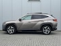 Hyundai Tucson 1.6 T-GDI HEV Premium Sky Eerste eigenaar/ Dealer onderhouden / Glazen schuif- en kanteldak / Trekgewicht 1650 Kg/ Trekhaak  / Elektrische achterklep / Adaptief cruise control / Stuur- en Stoelverwarming / Stoelventilatie /