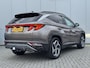 Hyundai Tucson 1.6 T-GDI HEV Premium Sky Eerste eigenaar/ Dealer onderhouden / Glazen schuif- en kanteldak / Trekgewicht 1650 Kg/ Trekhaak  / Elektrische achterklep / Adaptief cruise control / Stuur- en Stoelverwarming / Stoelventilatie /
