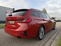 BMW 3-Serie Touring 330e High Exe 87DKM/PANO/LASER/TREKHAAK/HEAD-UP/H&K/ACC/360CAMERA/LEER-SPORT/18"/SHADOW-LINE/SOH 91,5%/MELBOURNE-RED METALLIC/NET OH BEURT GEHAD BIJ BMW DEALER