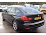 BMW 3-Serie Gran Turismo 320i xDrive High Executive Stoelverwarming, Navigatie, Climate control, Cruise control, Lederen interieur