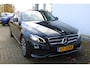 Mercedes-Benz E-klasse 350 e Lease Edition | Incl. 12 maanden Garantie | Elektrisch wegklapbare trekhaak | Stoelverwarming | Luchtvering | Climate controle | High-performance LED-koplampen | Navigatie | Cruise controle | 18 Inch LMV | Parkeersensoren V+A | Sfeerverlichting | Apple CarPlay/Android Auto |  360* Camera | Lederen bekleding | Origineel NL Auto | NAP |