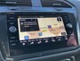 Volkswagen Tiguan 2.0 TDI Highline 150 PK DSG | Automaat | R-Line Exterieur | Trekhaak | Panoramadak | Elektrische Achterklep | Digital Cockpit Pro | Achteruitrijcamera | Stoelverwarming | Navigatie | Climate Control | Park Assist | Adaptive Cruise Control | Grootlicht Assistent | Parkeersensoren | DAB Radio | Bluetooth |