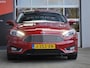 Ford Focus Wagon 1.0 First Edition | Stoel en stuurverwarming | Trekhaak | Navigatie | Elektrische ramen | Keyless start | Lichtmetalen velgen | Voorruitverwarming | Cruise control | Parkeersensoren voor en achter