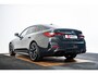 BMW i4 eDrive40 84 kWh M Sport - Trekhaak - Elektrisch verwarmde voorstoelen - Active Cruise Control - Getinte Ruiten - Comfort Access - Hifi - Ambiance verlichting -  Live Cockpit Professional - IconicSounds Electric -