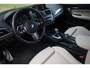 BMW 1-Serie M135i xDrive High Executive Aut. | M-Pakket | Harman-Kardon | Sportstoelen | Prof. Navi | Schuif-Kanteldak | NAP |