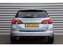 Opel Astra Sports Tourer 1.6 TURBO 200PK INNOVATION+ / NAVI / LEDER / CLIMA / FULL-LED / PDC / AGR / CAMERA / 18" BI-COLOR / TREKHAAK / KEYLESS / SCHUIF-KANTELDAK / UNIEK !!