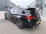 BMW 1-Serie M140i xDrive Edition Shadow High Executive OPEN DAK | ACHTERUIT RIJ CAMERA | NAVIGATIE | SFEERVERLICHTING | HARMANKARDON | F1 STUUR | LEDER | ELEKTRISCHE STOELEN MEMORY |