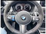 BMW 1-Serie M140i xDrive Edition Shadow High Executive OPEN DAK | ACHTERUIT RIJ CAMERA | NAVIGATIE | SFEERVERLICHTING | HARMANKARDON | F1 STUUR | LEDER | ELEKTRISCHE STOELEN MEMORY |