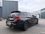 BMW 1-Serie M140i xDrive Edition Shadow High Executive OPEN DAK | ACHTERUIT RIJ CAMERA | NAVIGATIE | SFEERVERLICHTING | HARMANKARDON | F1 STUUR | LEDER | ELEKTRISCHE STOELEN MEMORY |