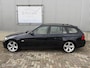 BMW 3-Serie Touring 318i E91 Executive 2008 / Leer / Trekhaak / Carplay breedbeeld / Stoelverwarming / NAP