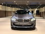 BMW 1-Serie M135i xDrive High Executive PANO|M-Sport|HarmanCardon|HUD|Carplay|Stoel&Stuur verwarming|Keyless|Virtual Dash|ACC