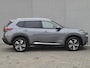 Nissan X-Trail 1.5 e-4orce Tekna 4WD Automaat / Fabrieksgarantie tot 06-2027 / Dealer onderhouden / Allseason banden / Trekgewicht 1800 kg / HUD / Elektrische achterklep / Stuur-, Stoel en Achterbank verwarming / Adaptief CC / Voorruit verwarming /