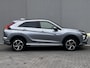 Mitsubishi Eclipse Cross 2.4 PHEV Business Executive 4WD Automaat / Fabrieksgarantie tot 11-2031 mogelijk ** / Goed onderhouden / Camera 360° / Stuur-, stoel- en achterbankverwarming / Adaptieve Cruise Control / Apple Carplay Android / 18" LM wielen met All Season banden /