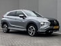 Mitsubishi Eclipse Cross 2.4 PHEV Business Executive 4WD Automaat / Fabrieksgarantie tot 11-2031 mogelijk ** / Goed onderhouden / Camera 360° / Stuur-, stoel- en achterbankverwarming / Adaptieve Cruise Control / Apple Carplay Android / 18" LM wielen met All Season banden /