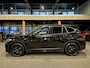 BMW X1 xDrive25e High Executive Sportline | Black edition | Camera | HUD | Leder | Trekhaak | Navigatie | Stoelverwarming | Carplay