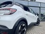 Renault Captur 1.6 E-Tech Full Hybrid 145 Techno | Stoel+Stuurverwarming | Climate Control | Draadloze Telefoonlader | Camera + Sensoren | Two-Tone | Apple CarPlay/Android Auto