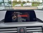 BMW 1-Serie 118i Corporate Lease Essential - CARPLAY/ANDROID - XENON - PDC - NAVI - CRUISE - NL AUTO -