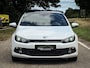 Volkswagen Scirocco 1.4 TSI Highline | UNIEK! | 14.000 KM | 1e eig. |Volledige historie | Navi | Panorama | Xenon | H.Leder |