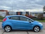 Ford Fiesta 1.25 Titanium 5-Drs ECC Audio/CD ABS Cruisecontrol Colorpakket Achterspoiler LMV 15" ESP Dealeronderh. Apk 30/06/2026