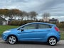 Ford Fiesta 1.25 Titanium 5-Drs ECC Audio/CD ABS Cruisecontrol Colorpakket Achterspoiler LMV 15" ESP Dealeronderh. Apk 30/06/2026