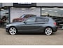 BMW 1-Serie 120i Sport Line 184PK , Trekhaak, Navi, PDC, Cruise, Bluetooth, LMV 18 Inch, Stoelverwarming