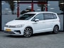 Volkswagen Touran 1.4 TSI Highline R 7p. | R-Line | LED Koplampen | Navigatie | Climate Control | Adaptieve Cruise Control | Stoelverwarming | Parkeersensoren | 7 Persoons | Privacy Glas | 18'' Lichtmetalen Velgen |
