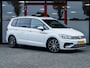 Volkswagen Touran 1.4 TSI Highline R 7p. | R-Line | LED Koplampen | Navigatie | Climate Control | Adaptieve Cruise Control | Stoelverwarming | Parkeersensoren | 7 Persoons | Privacy Glas | 18'' Lichtmetalen Velgen |