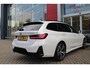 BMW 3-Serie Touring 330e 292PK M-SPORT | PANORAMISCH SCHUIF/KANTEL DAK | M-SPORT PRO-PAKKET | M-SPORT REMMEN UITGEVOERD IN DONKERBLAUW MET M LOGO | BMW LIVE COCKPIT PROFESSIONAL | CURVED DISPLAY |DRIVING ASSISTANT INCL. HEAD-UP DISPLAY | PARKING ASSIST INCL. ACHTERUITRIJCAMERA | ADAPTIEVE LED KOPLAMPEN |SHADOW LINE | M-SPORTSTOELEN VOOR | LEDER VERNASCA MET CONTRAST STIKSELS M-SPORT | STOEL VERWARMING | DRAADLOZE APPLE CARPLAY | ELEKTRISCH VERSTELBARE STOELEN MET GEHEUGEN FUNCTIE | HEAD UP DISPLAY | DRAADLOZE TELEFOONLADER | DODEHOEK BEWAKING | COMFORT PACK INCL. ELEKTRISCHE ACHTERKLEP | ADAPTIVE CRUISE CONTROL | HIFI AUDIO DAB+ RADIO | COMFORT ACCESS (KEYLESS ENTRY)| DONKER GETINTE ACHTERRUITEN |