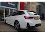 BMW 3-Serie Touring 330e 292PK M-SPORT | M-SPORT PRO-PAKKET | M-SPORT REMMEN UITGEVOERD IN DONKERBLAUW MET M LOGO | BMW LIVE COCKPIT PROFESSIONAL | CURVED DISPLAY |DRIVING ASSISTANT INCL. HEAD-UP DISPLAY | PANORAMISCH SCHUIF/KANTEL DAK | PARKING ASSIST INCL. ACHTERUITRIJCAMERA | ADAPTIEVE LED KOPLAMPEN |SHADOW LINE | M-SPORTSTOELEN VOOR | LEDER VERNASCA MET CONTRAST STIKSELS M-SPORT | STOEL VERWARMING | DRAADLOZE APPLE CARPLAY | ELEKTRISCH VERSTELBARE STOELEN MET GEHEUGEN FUNCTIE | HEAD UP DISPLAY | DRAADLOZE TELEFOONLADER | DODEHOEK BEWAKING | COMFORT PACK INCL. ELEKTRISCHE ACHTERKLEP | ADAPTIVE CRUISE CONTROL | HIFI AUDIO DAB+ RADIO | COMFORT ACCESS (KEYLESS ENTRY)| DONKER GETINTE ACHTERRUITEN |