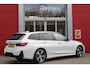 BMW 3-Serie Touring 330e 292PK M-SPORT | M-SPORT PRO-PAKKET | M-SPORT REMMEN UITGEVOERD IN DONKERBLAUW MET M LOGO | BMW LIVE COCKPIT PROFESSIONAL | CURVED DISPLAY |DRIVING ASSISTANT INCL. HEAD-UP DISPLAY | PANORAMISCH SCHUIF/KANTEL DAK | PARKING ASSIST INCL. ACHTERUITRIJCAMERA | ADAPTIEVE LED KOPLAMPEN |SHADOW LINE | M-SPORTSTOELEN VOOR | LEDER VERNASCA MET CONTRAST STIKSELS M-SPORT | STOEL VERWARMING | DRAADLOZE APPLE CARPLAY | ELEKTRISCH VERSTELBARE STOELEN MET GEHEUGEN FUNCTIE | HEAD UP DISPLAY | DRAADLOZE TELEFOONLADER | DODEHOEK BEWAKING | COMFORT PACK INCL. ELEKTRISCHE ACHTERKLEP | ADAPTIVE CRUISE CONTROL | HIFI AUDIO DAB+ RADIO | COMFORT ACCESS (KEYLESS ENTRY)| DONKER GETINTE ACHTERRUITEN |