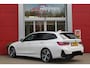 BMW 3-Serie Touring 330e 292PK M-SPORT | M-SPORT PRO-PAKKET | M-SPORT REMMEN UITGEVOERD IN DONKERBLAUW MET M LOGO | BMW LIVE COCKPIT PROFESSIONAL | CURVED DISPLAY |DRIVING ASSISTANT INCL. HEAD-UP DISPLAY | PANORAMISCH SCHUIF/KANTEL DAK | PARKING ASSIST INCL. ACHTERUITRIJCAMERA | ADAPTIEVE LED KOPLAMPEN |SHADOW LINE | M-SPORTSTOELEN VOOR | LEDER VERNASCA MET CONTRAST STIKSELS M-SPORT | STOEL VERWARMING | DRAADLOZE APPLE CARPLAY | ELEKTRISCH VERSTELBARE STOELEN MET GEHEUGEN FUNCTIE | HEAD UP DISPLAY | DRAADLOZE TELEFOONLADER | DODEHOEK BEWAKING | COMFORT PACK INCL. ELEKTRISCHE ACHTERKLEP | ADAPTIVE CRUISE CONTROL | HIFI AUDIO DAB+ RADIO | COMFORT ACCESS (KEYLESS ENTRY)| DONKER GETINTE ACHTERRUITEN |