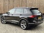 Volkswagen Tiguan 1.4 TSI R-line Handgeschakeld | Half/leer | R-line stuurwiel | LED verlichting | Stoelverwarming | Zwarte hemelbekleding | Apple CarPlay | Adaptieve cruise control | Parkeersensoren voor en achter
