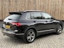 Volkswagen Tiguan 1.4 TSI R-line Handgeschakeld | Half/leer | R-line stuurwiel | LED verlichting | Stoelverwarming | Zwarte hemelbekleding | Apple CarPlay | Adaptieve cruise control | Parkeersensoren voor en achter
