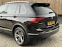 Volkswagen Tiguan 1.4 TSI R-line Handgeschakeld | Half/leer | R-line stuurwiel | LED verlichting | Stoelverwarming | Zwarte hemelbekleding | Apple CarPlay | Adaptieve cruise control | Parkeersensoren voor en achter