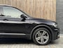Volkswagen Tiguan 1.4 TSI R-line Handgeschakeld | Half/leer | R-line stuurwiel | LED verlichting | Stoelverwarming | Zwarte hemelbekleding | Apple CarPlay | Adaptieve cruise control | Parkeersensoren voor en achter